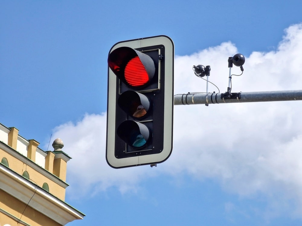 How Tickets Are Issued After a Red Light Camera Flash?
